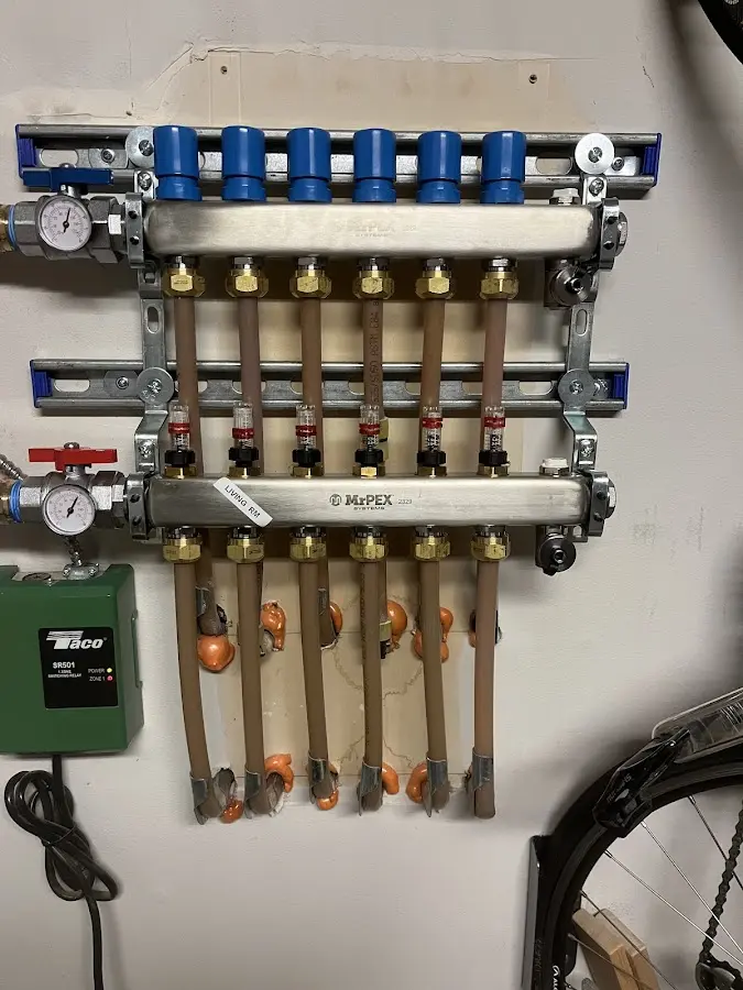 Plumber performing Gas Line Installation at a residential property in St. James